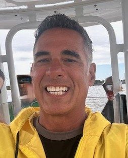 Jeffrey Beauregard on a boat